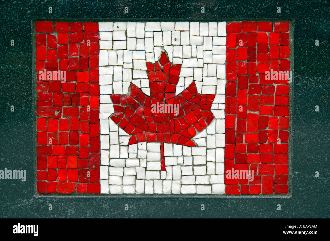 A mosaic of the Canadian flag below 'The Universal Soldier', the Korean Veterans Memorial, Battery Park,  New York, US. Stock Photo