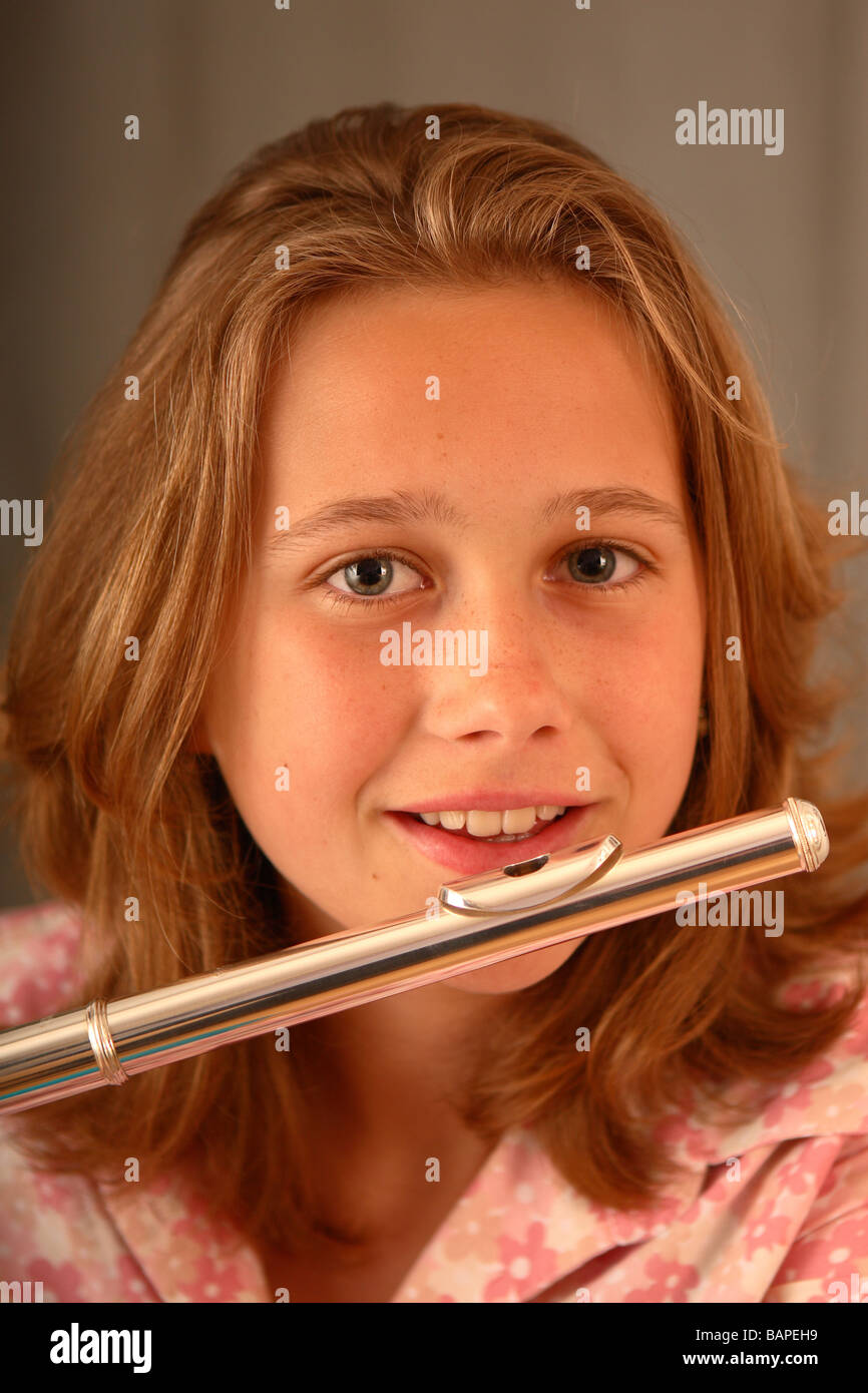 Young teenage girl musician with flute musical instrument Stock Photo Alamy