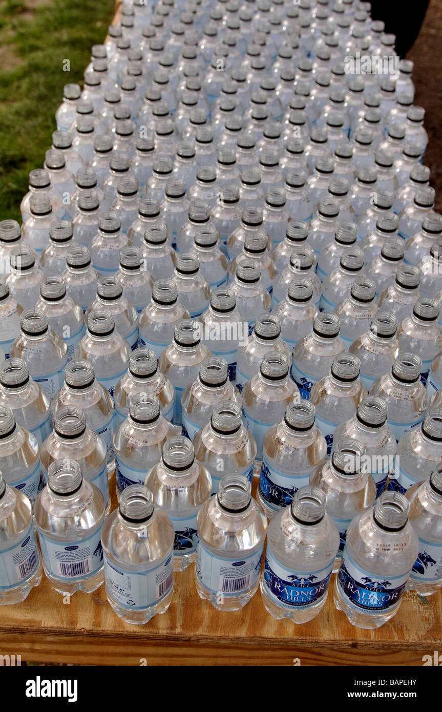 Bottles of water at a marathon drinks station, UK Stock Photo