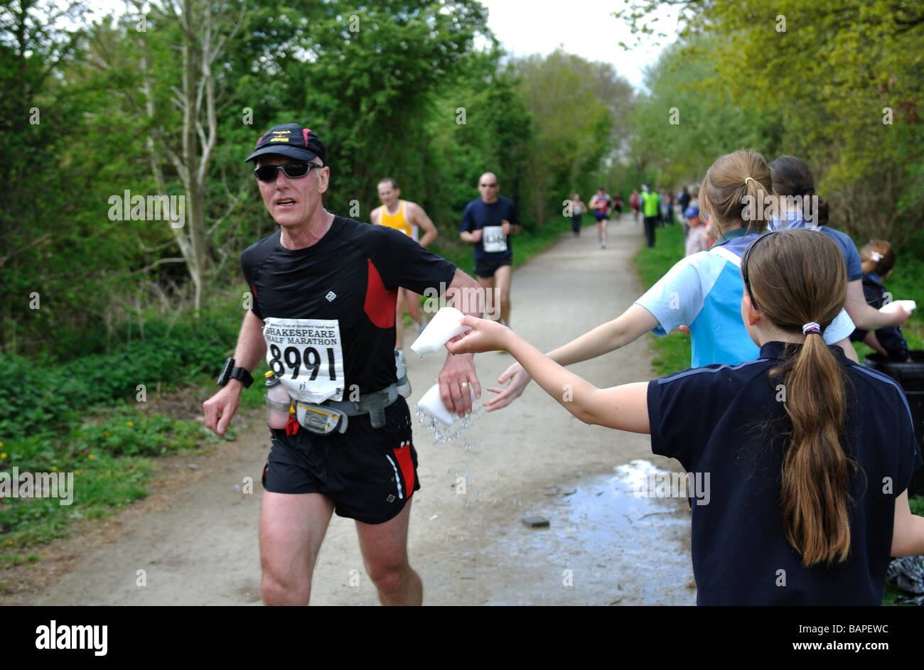 Wet sponges handed out at a marathon race, UK Stock Photo
