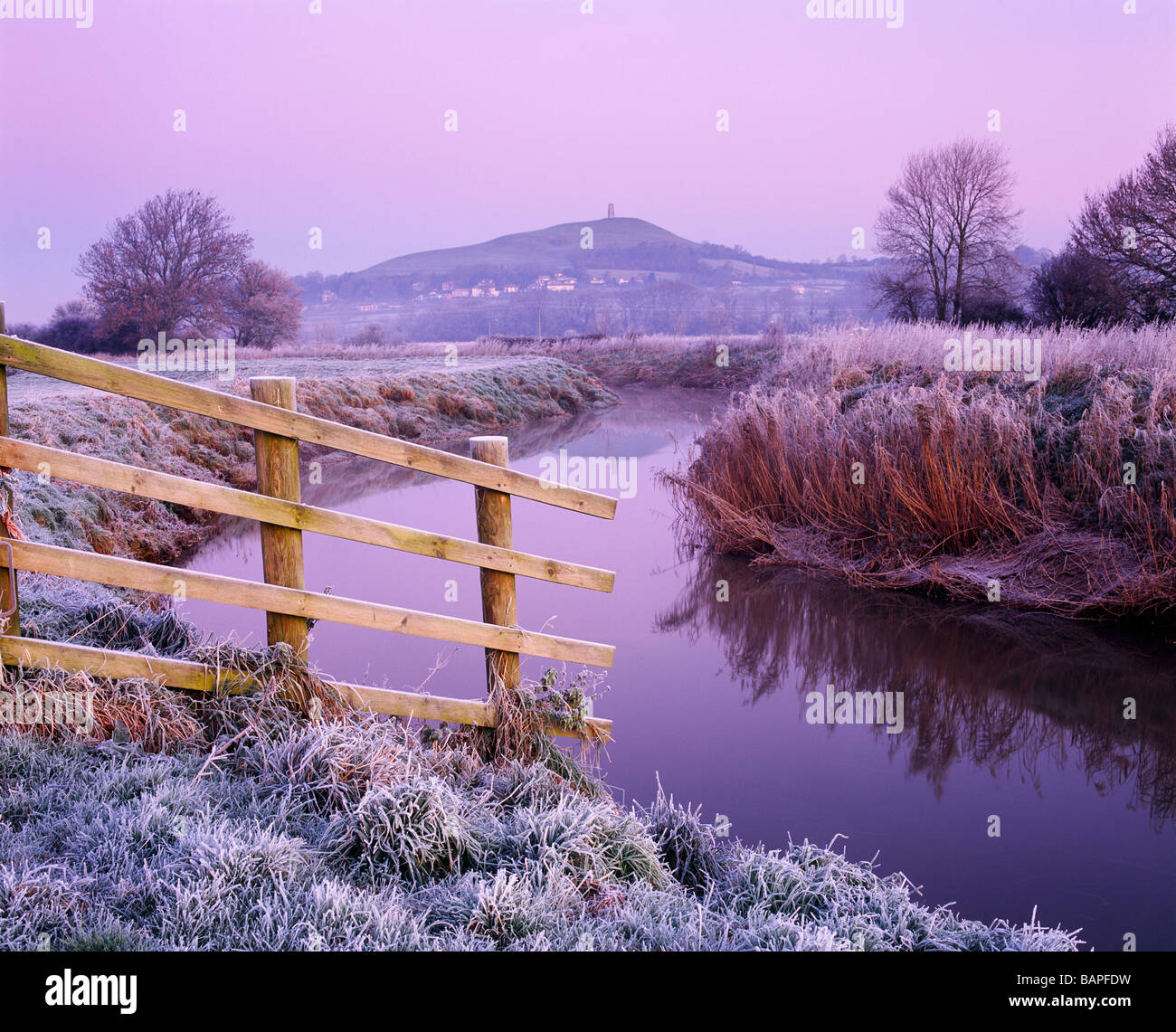 The River Brue on South Moor on the Somerset Levels at Glastonbury with Glastonbury Tor in the distance, Somerset, England Stock Photo