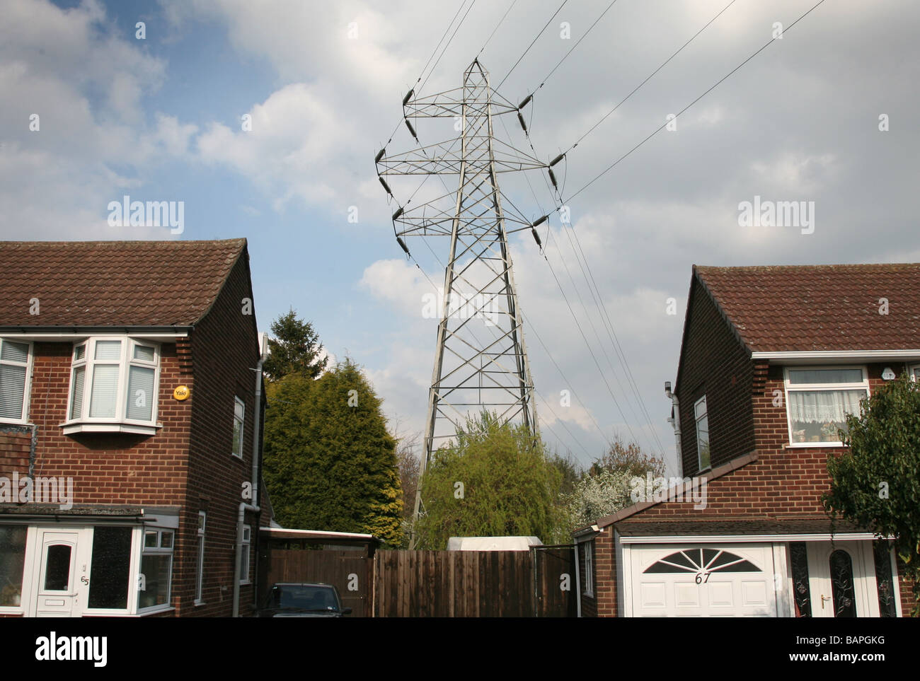Pylon near housing Stock Photo Alamy