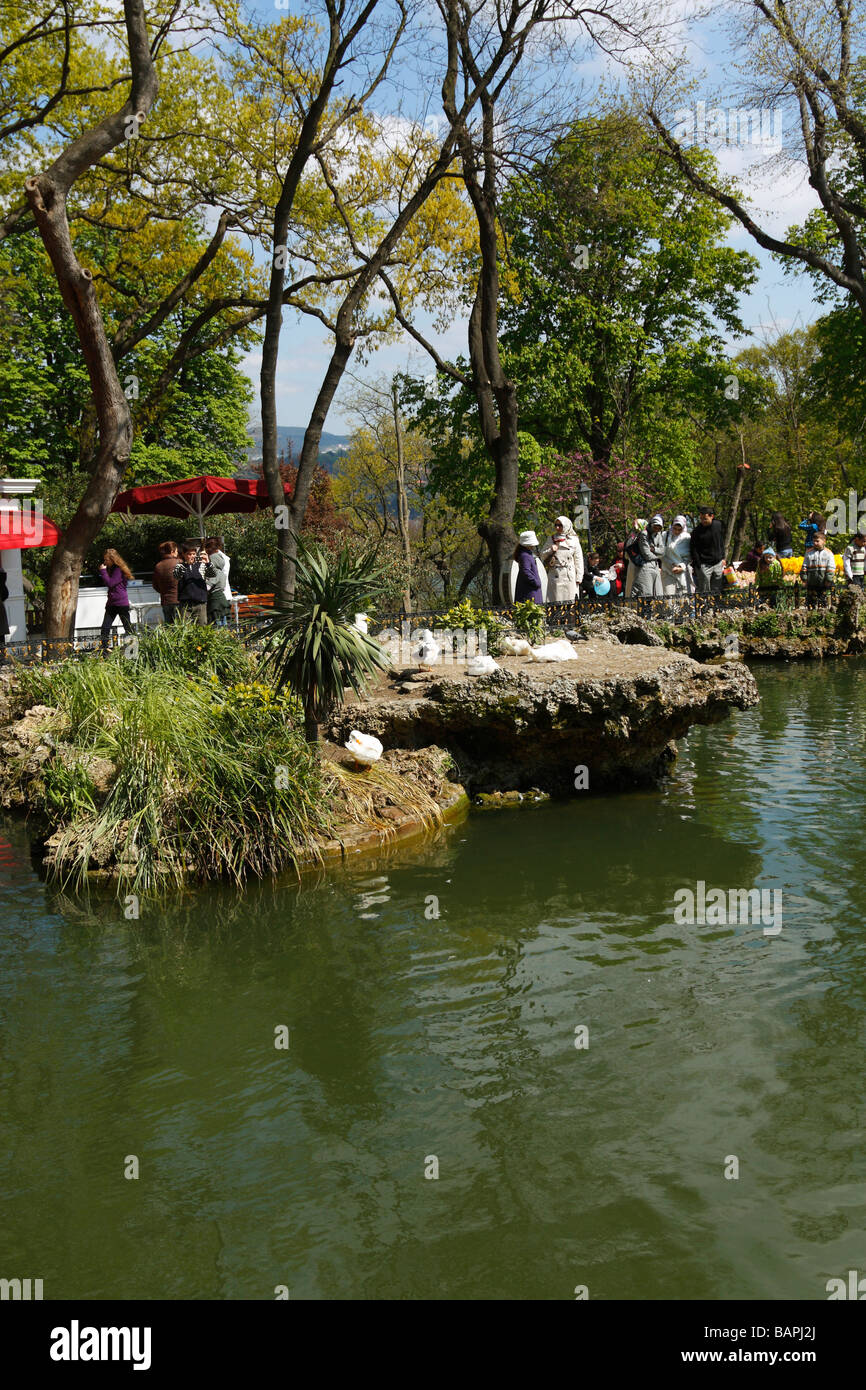 Turkish people walking around the pond in Emirgan Parkı, Istanbul, Turkey, April 2009 Stock Photo