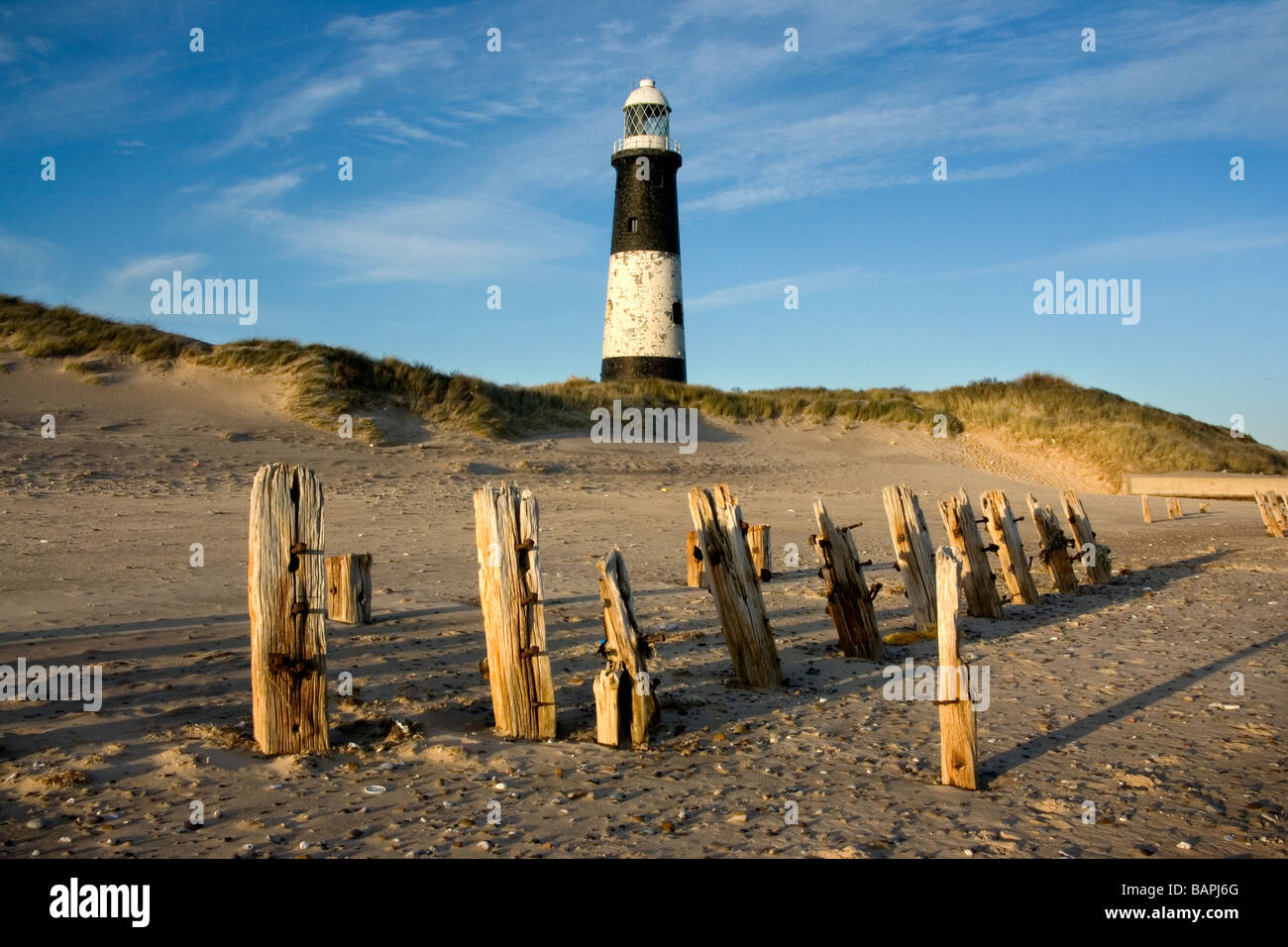 A view of the old lighthouse which stands on Spurn Point, a nature reserve by the Humber Estuary and North Sea, Humberside, UK Stock Photo