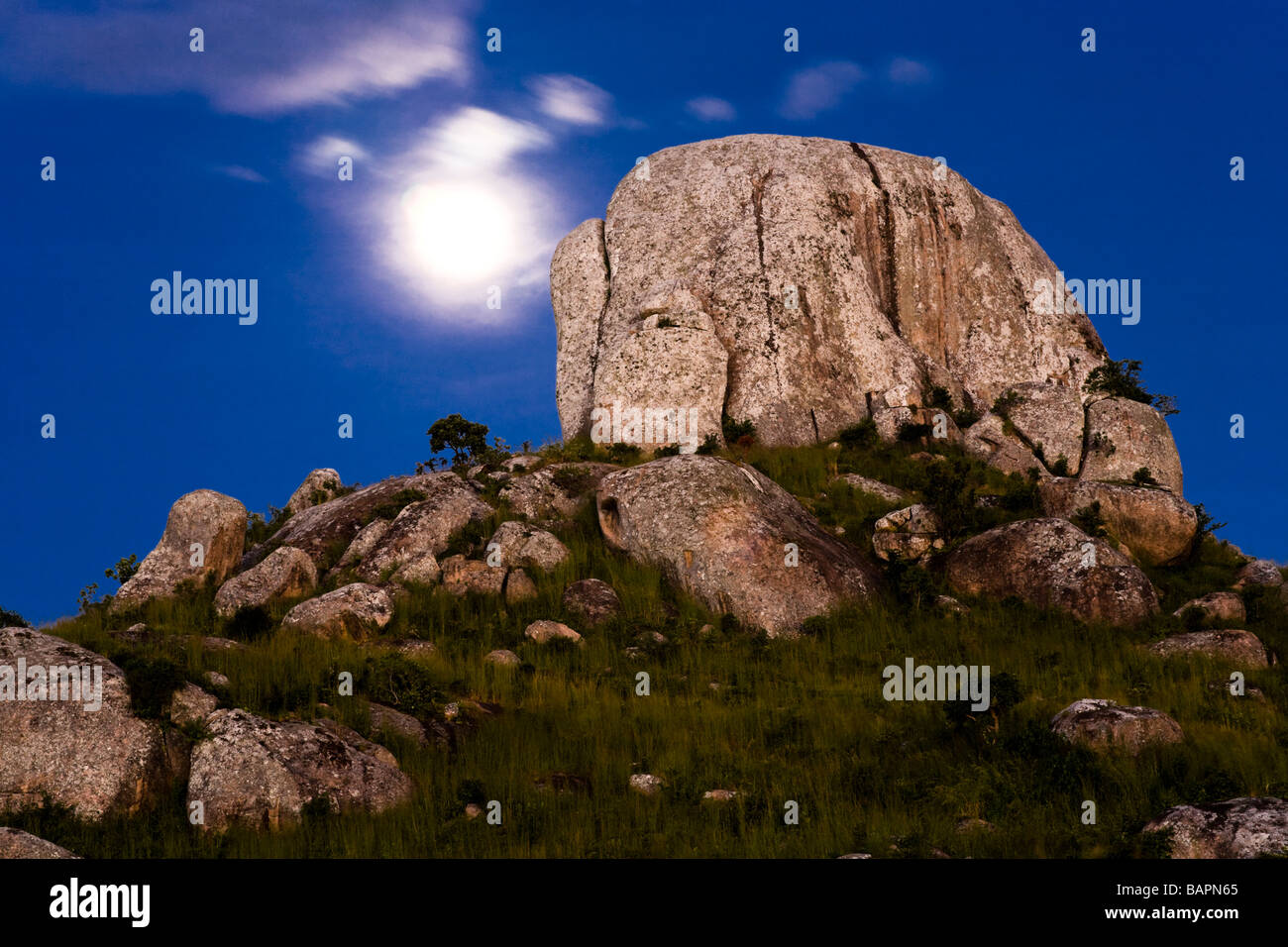 Moonrise over rock formations below Dedza Mountain - Dedza, Malawi, Africa Stock Photo