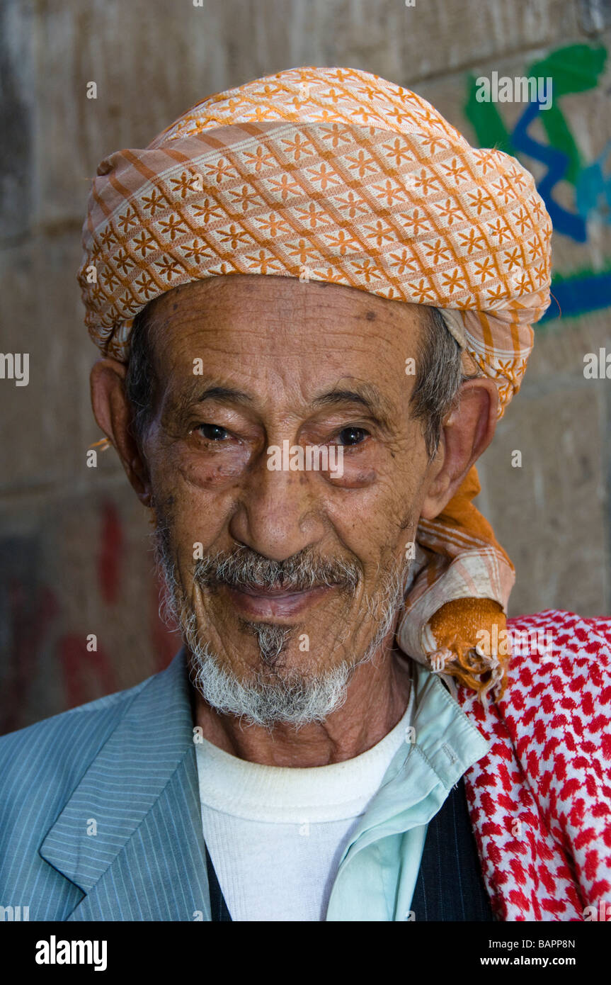 Yemeni man in the old town district of Sana'a Yemen Stock Photo