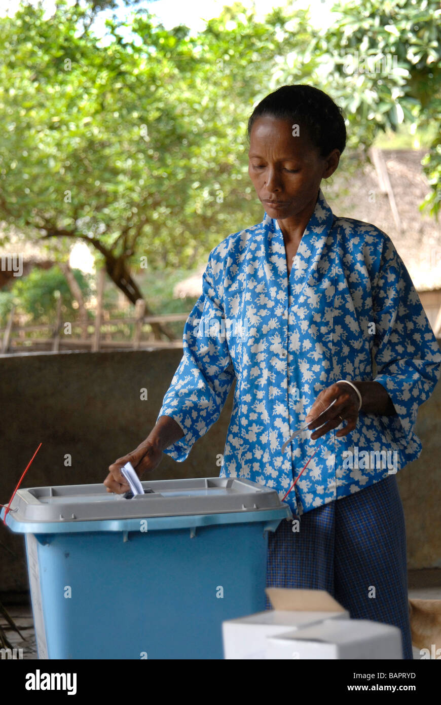 A woman voting in the Viqueque district of Timor Leste in the 2007 parliamentary election. Stock Photo