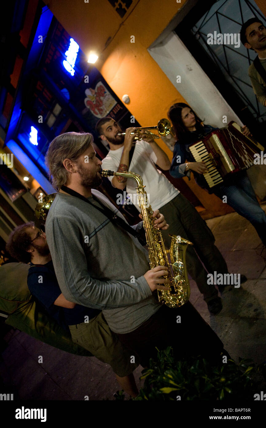 Street musicians playing in Plaza Serrano bars, Palermo Soho, Buenos Aires, Argentina Stock Photo