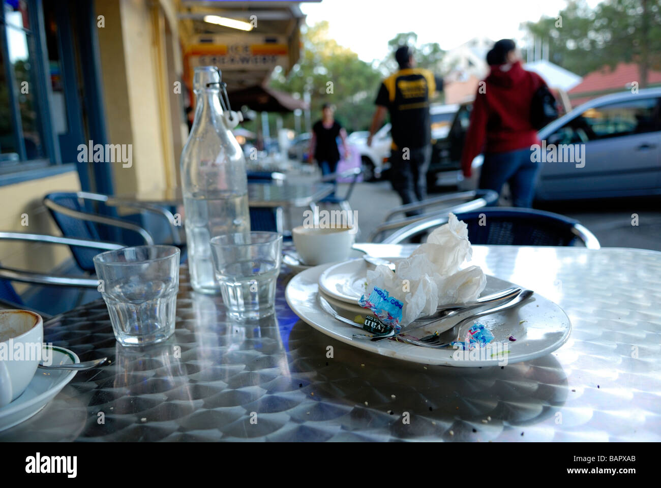 Remnants of a meal at a sidewalk restaurant. Fremantle, Perth, Western Australia Stock Photo