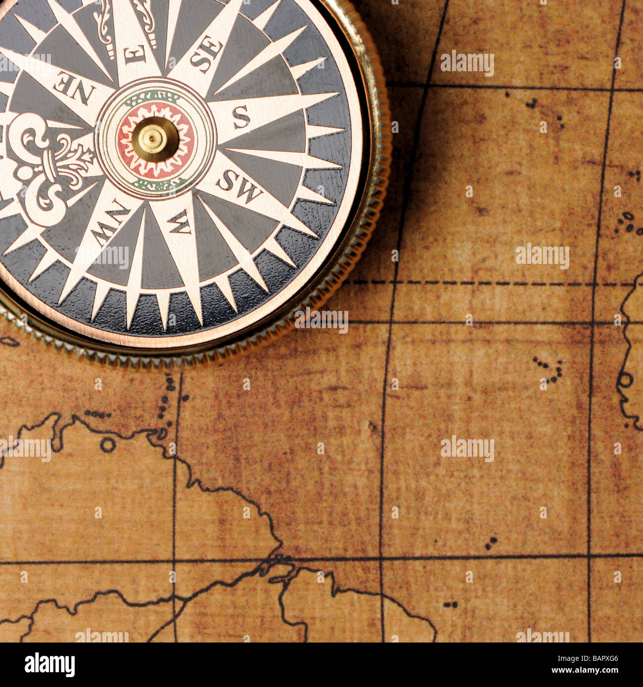 Old compass and map background Old gold color Stock Photo - Alamy