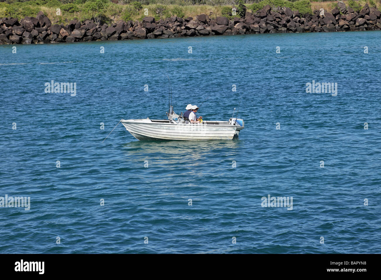 Two men in a boat hi-res stock photography and images - Alamy