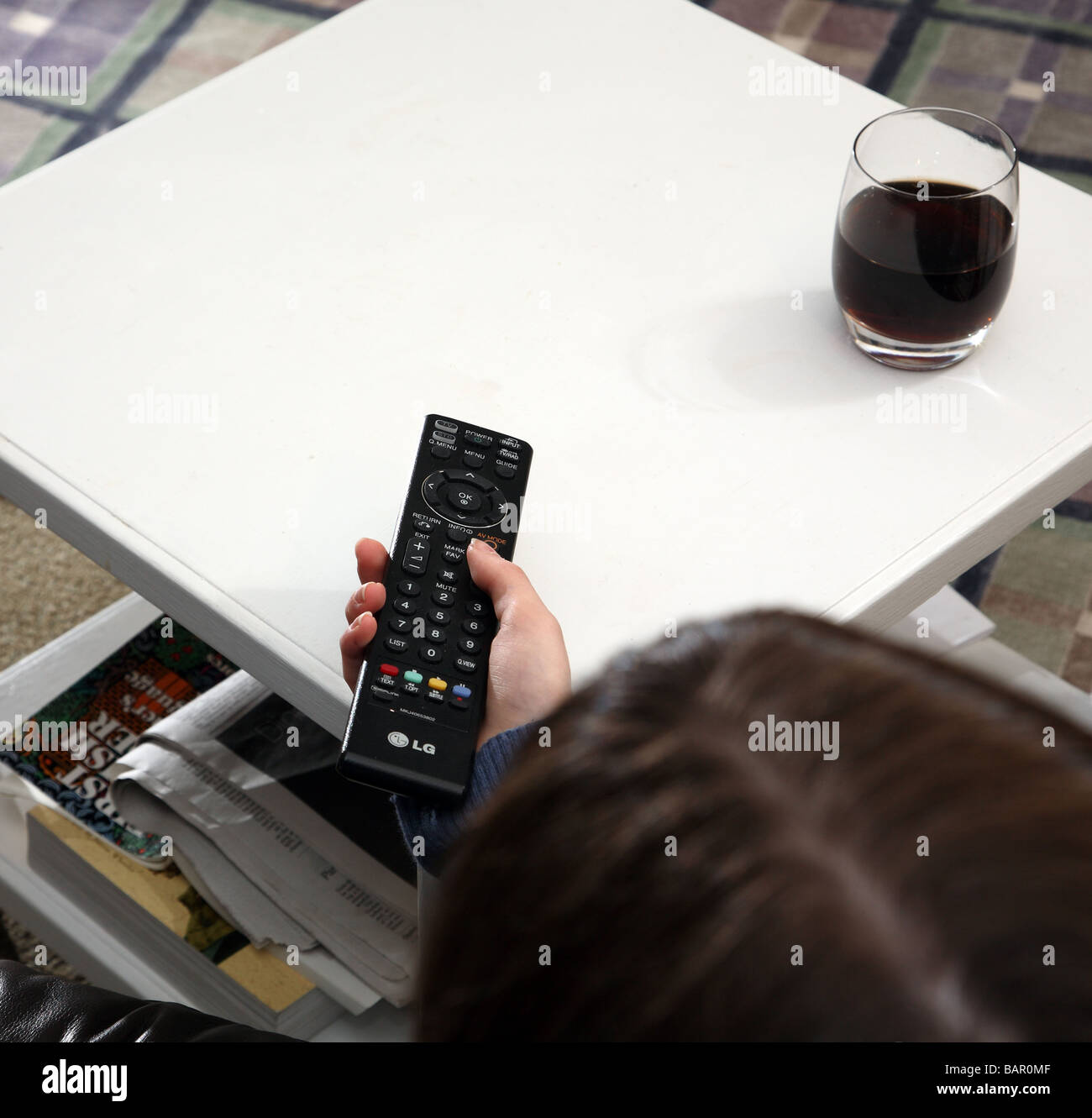 teenager using remote Stock Photo - Alamy