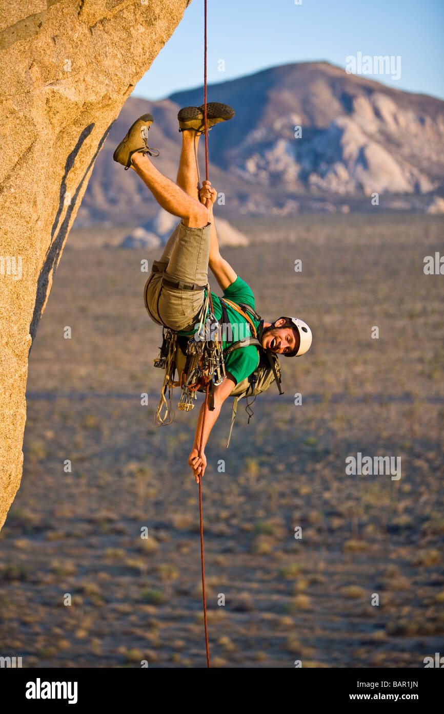 A rock climber rappelling Stock Photo Alamy