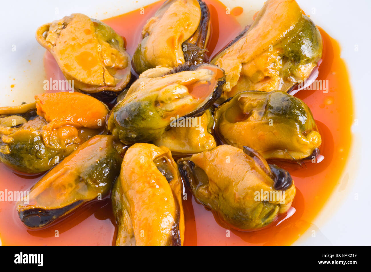 Mussels in red sauce Stock Photo Alamy