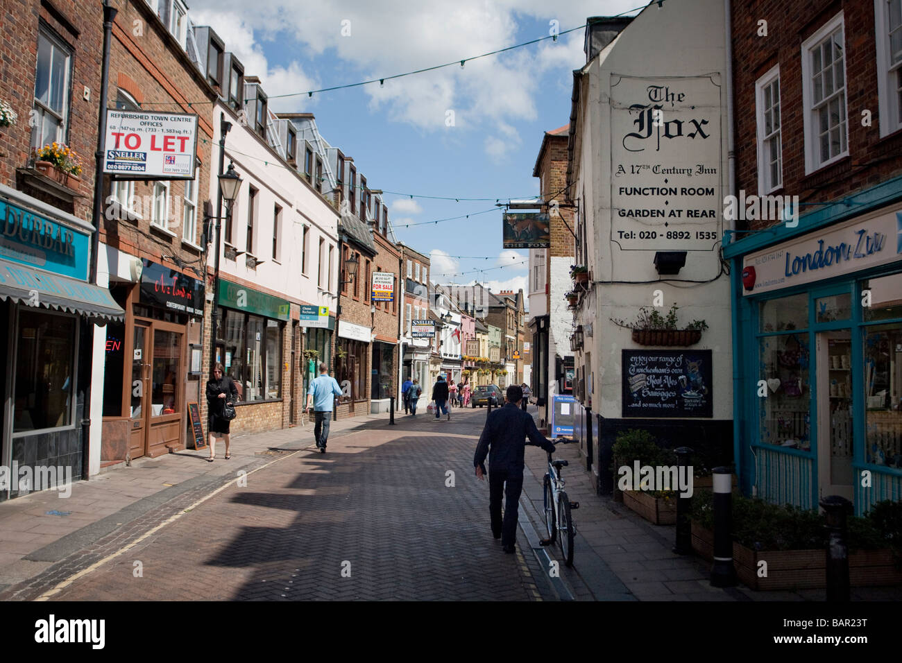 the pedestrianised Church Street of Twickenham London and The Fox Pub