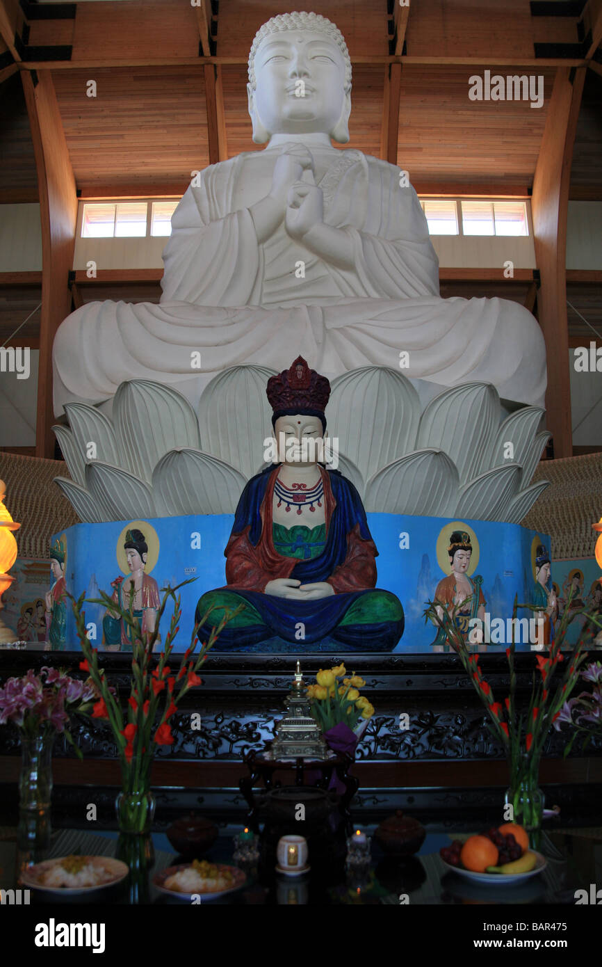Buddha Vairocana and KuanYin statues in the Great Buddha Hall at the