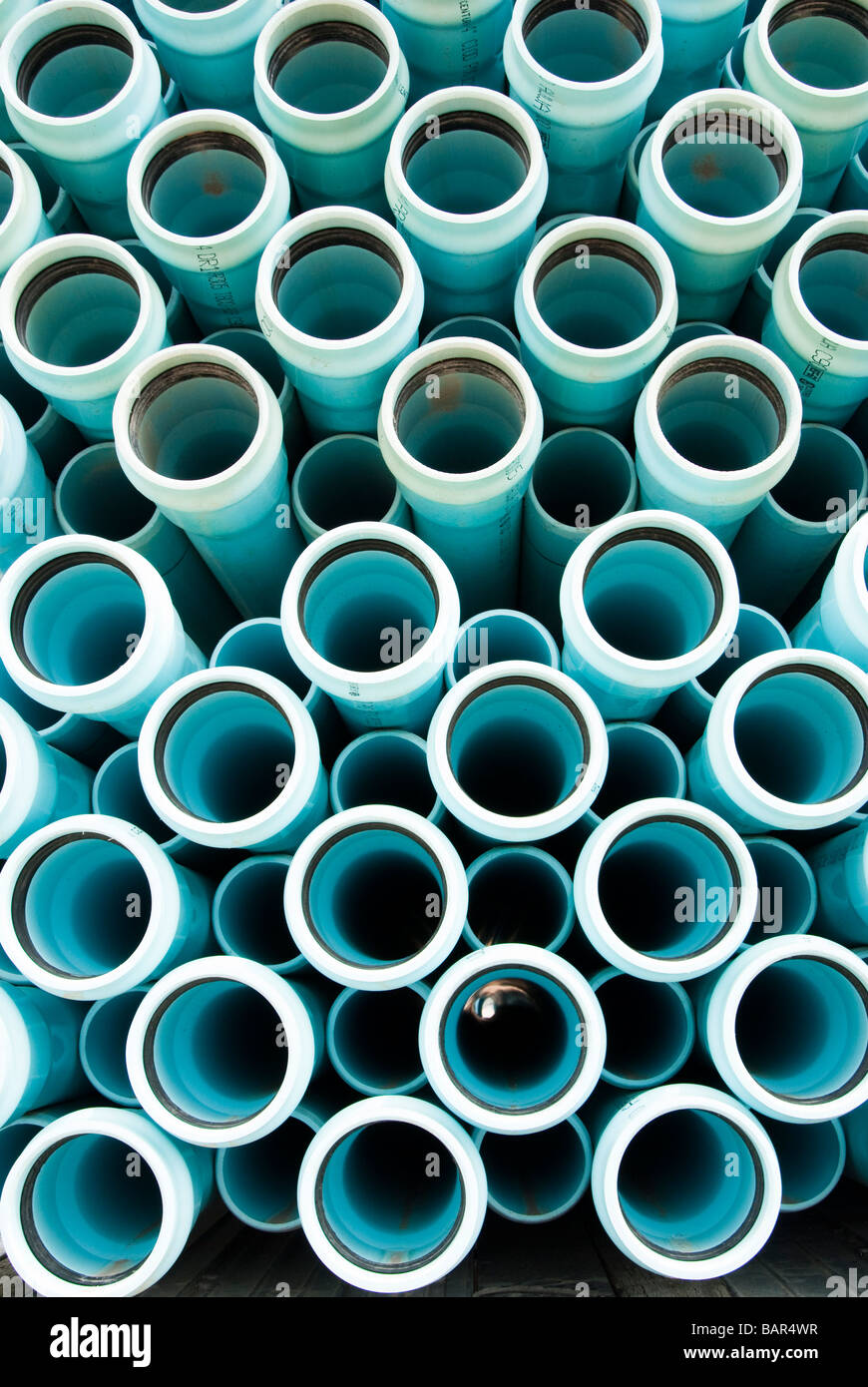 pvc water and sewer pipe being transported to a construction site Stock ...