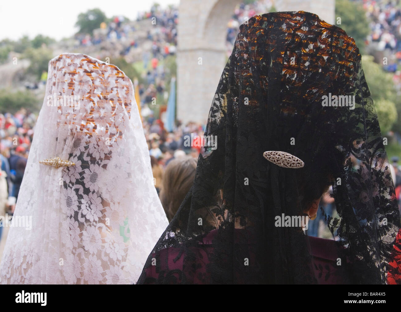 Spanish ladies in typical lace mantillas Stock Photo