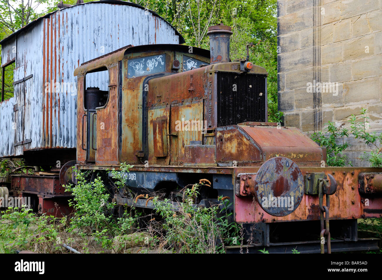 Derelict old disused train engine made by Fowler works at Armley Mills