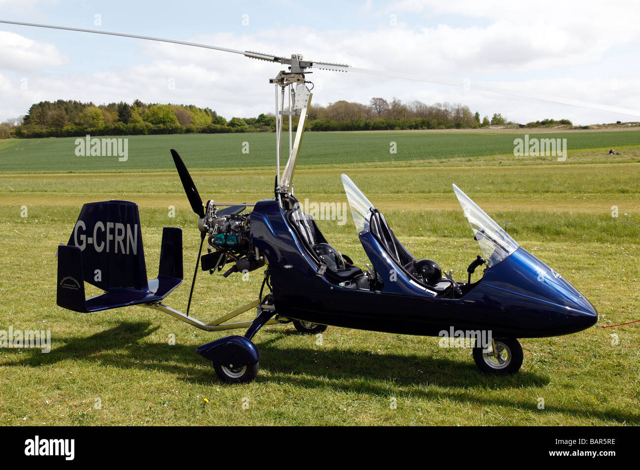 An autogyro flying at Popham airfield in Hampshire in England Stock
