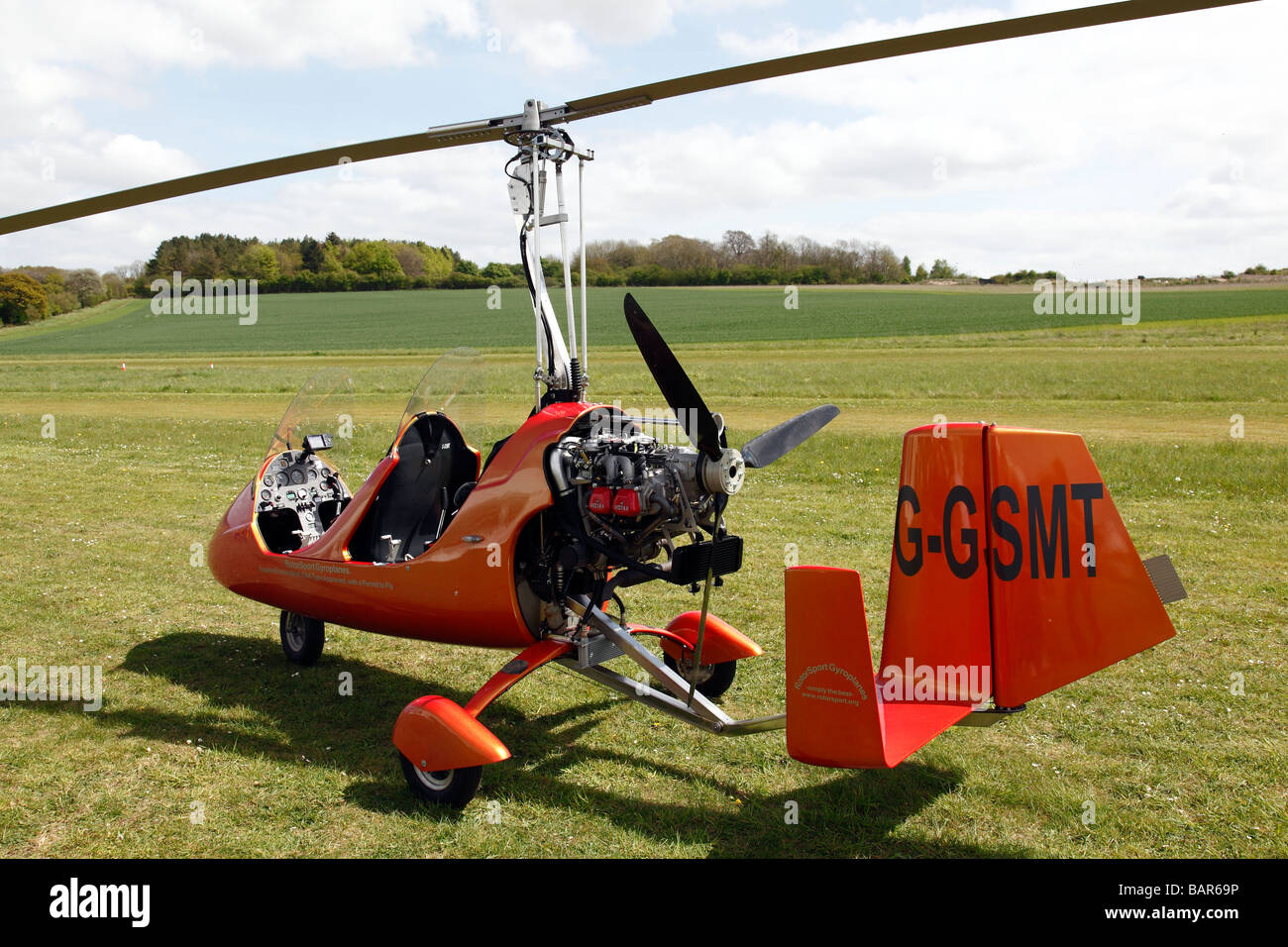 An autogyro flying at Popham airfield in Hampshire in England Stock Photo