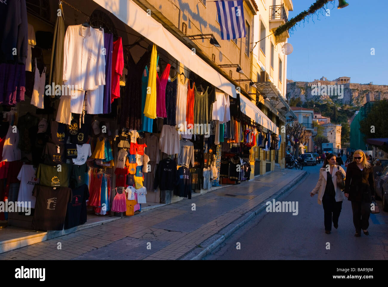 Shops in Monastiraki district with Acropolis in background in Athens Greece Europe Stock Photo