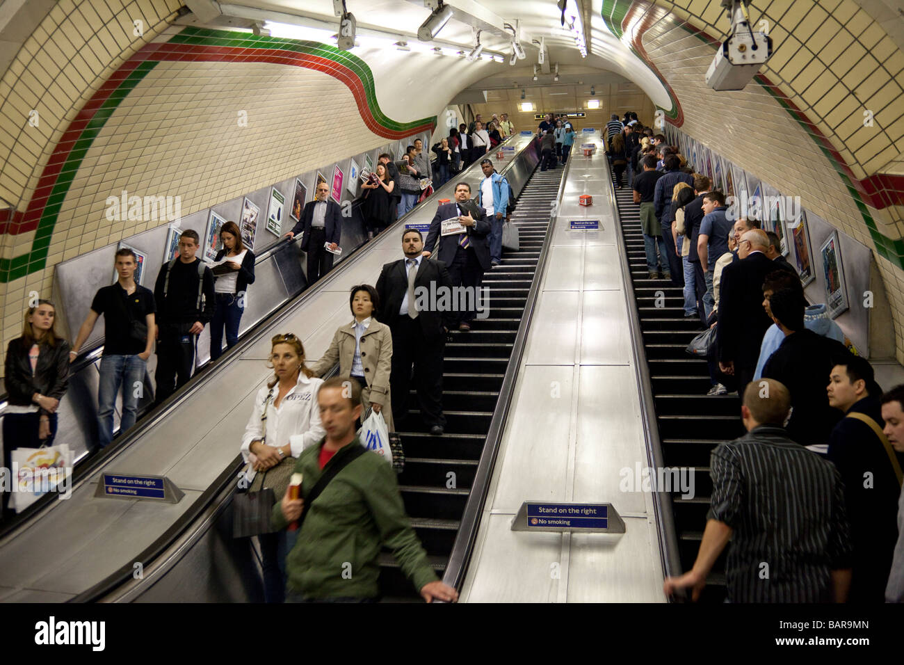 crowded escalators, London Underground, London, England Stock Photo Alamy