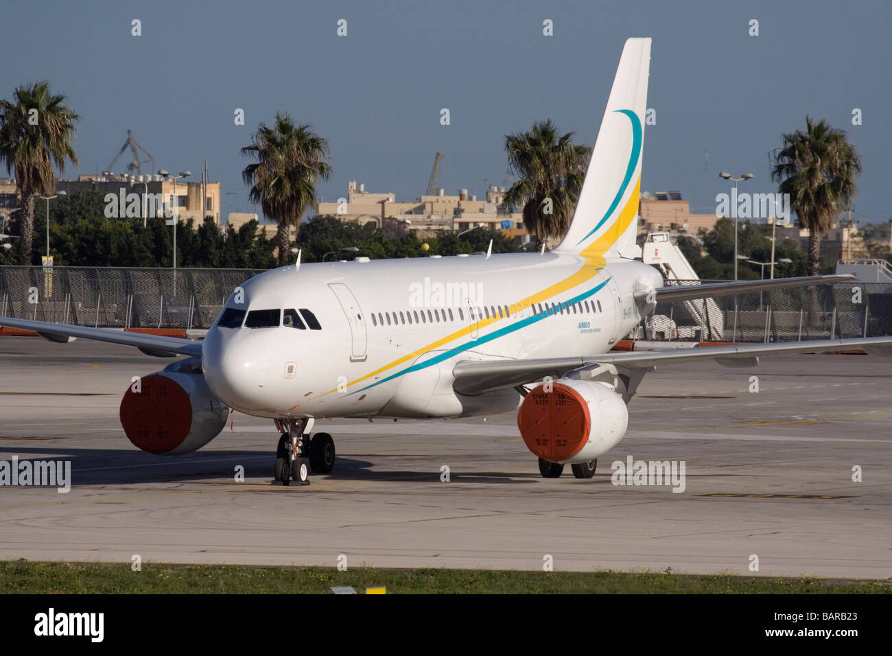 Comlux Aviation Airbus A319CJ corporate jet on the ground at Malta International Airport Stock Photo