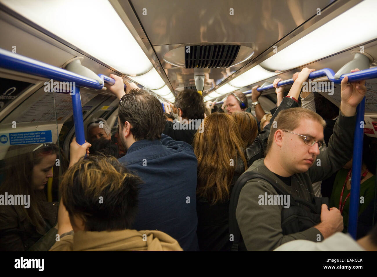 crowded tube carriage, London Underground, London, England Stock Photo