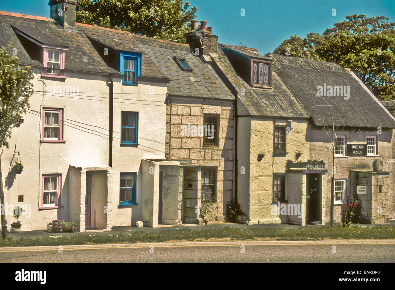 terraced Portland stone cottages and museum at Wakeham Isle of Portland Dorset England UK Stock Photo