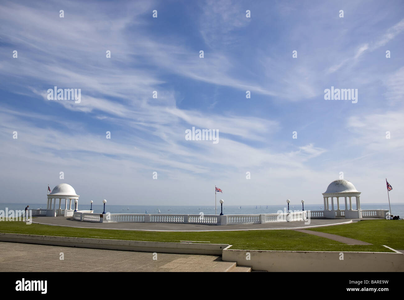 A promenade with two domed buildings Stock Photo