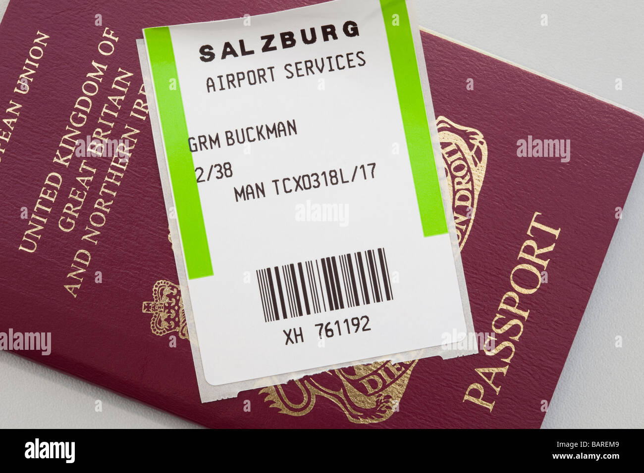 British UK passport with plane flight luggage ticket  for travel abroad Stock Photo