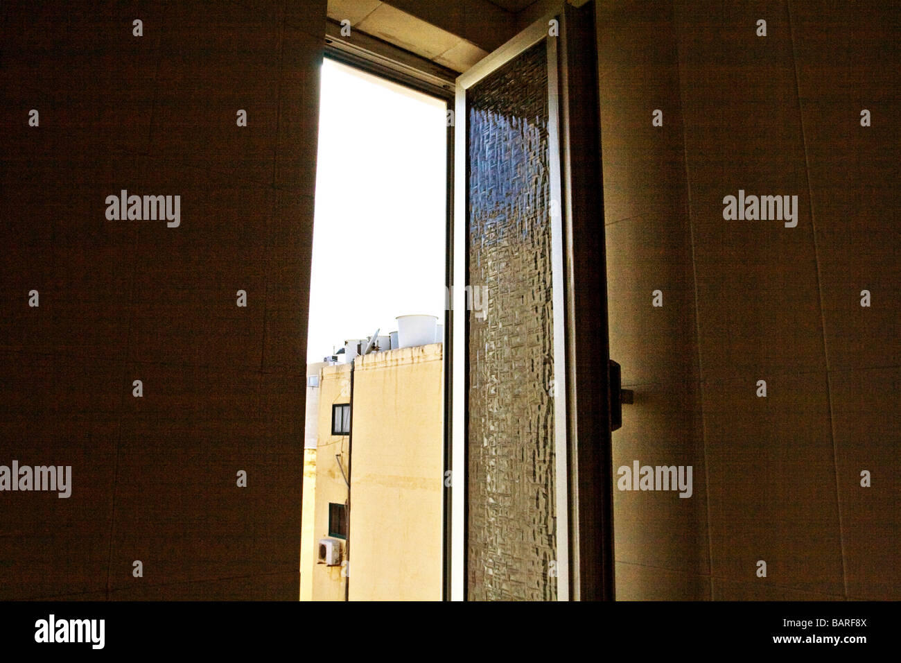View looking through open hotel bathroom window, Sliema Malta Stock