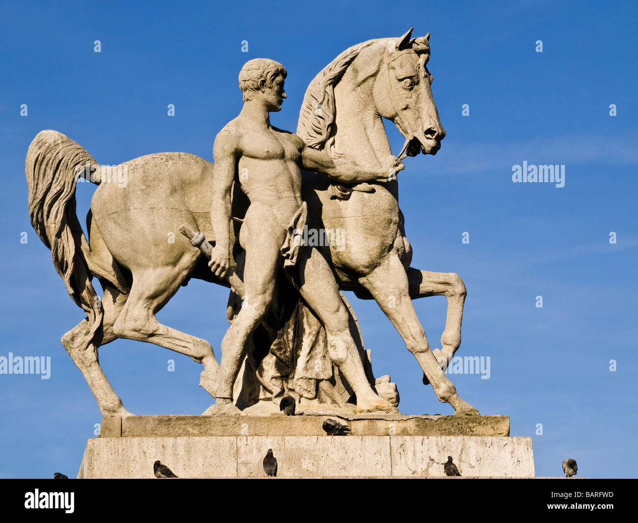 Statue of man and horse Stock Photo Alamy