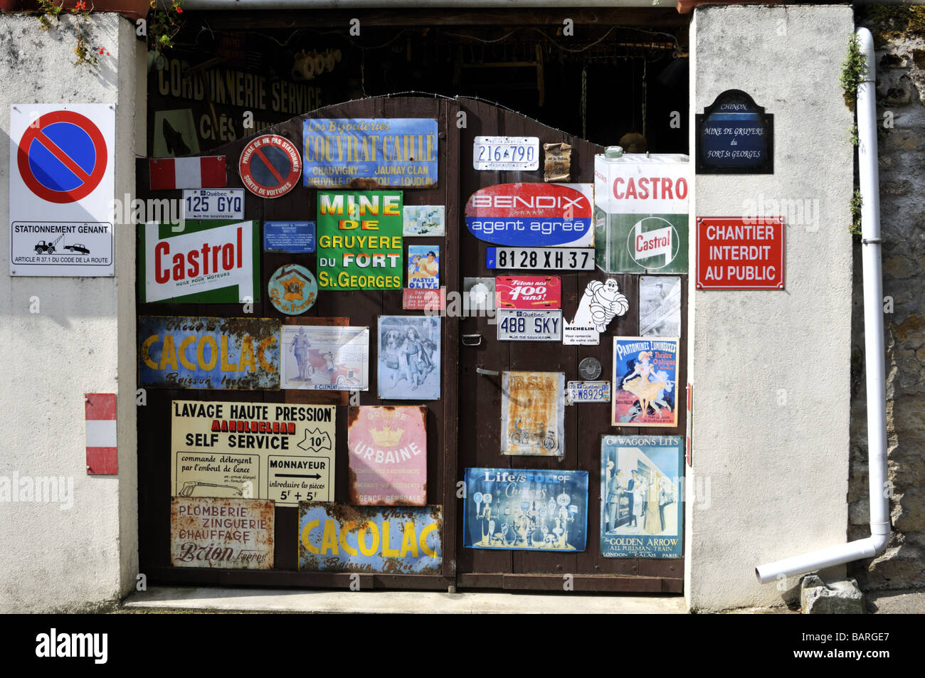 Collection of French signs, adverts plates and car registration plate. Stock Photo