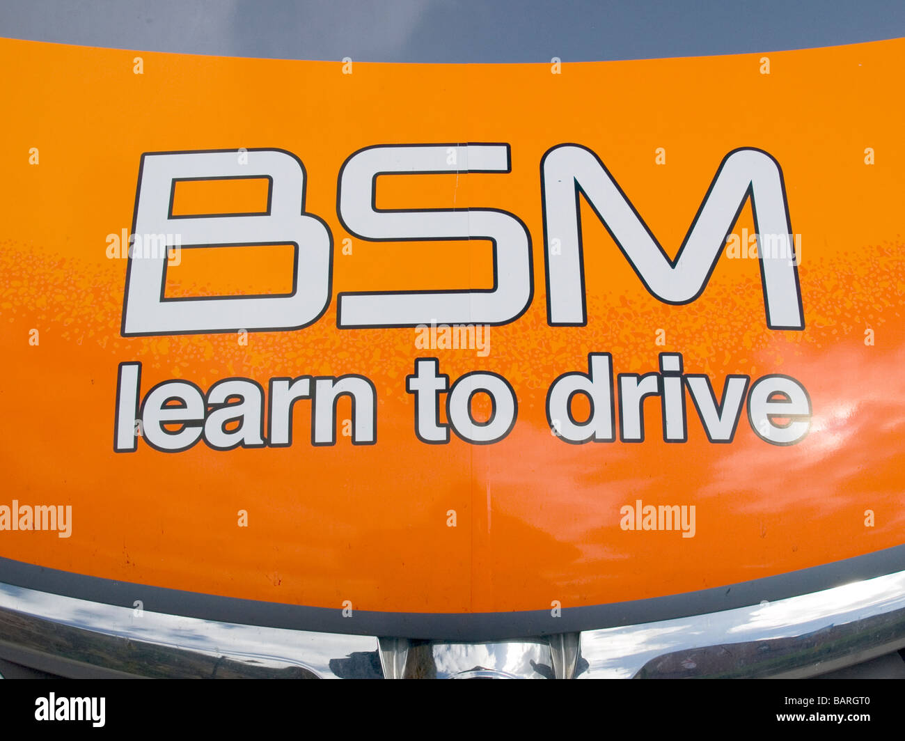 BSM Learn to Drive legend on the bonnet of a British School of Motoring Car Stock Photo