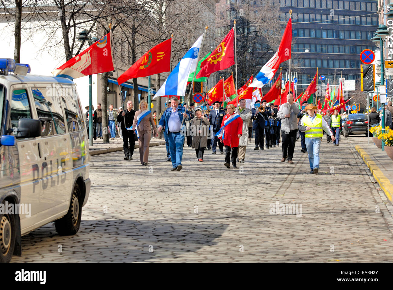 The Finnish labour union, SAK, May Day parade with the red union flag at the Esplanade. Helsinki, Finland, Scandinavia, Europe. Stock Photo