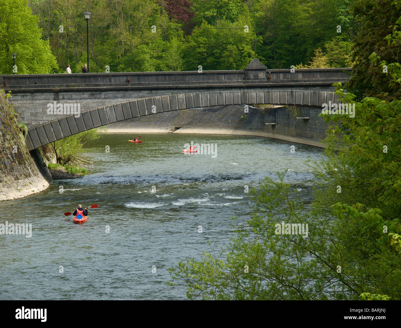 The river Ourthe with people kayaking under the bridge in Durbuy the  smallest city in Belgium Stock Photo - Alamy