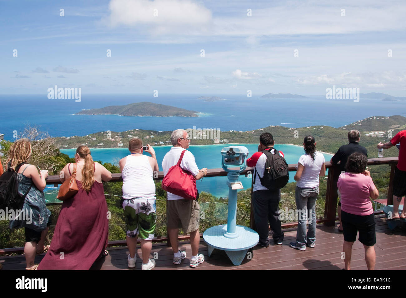 Tourists enjoying the view of the Virgin Islands from Mountaintop Stock Photo