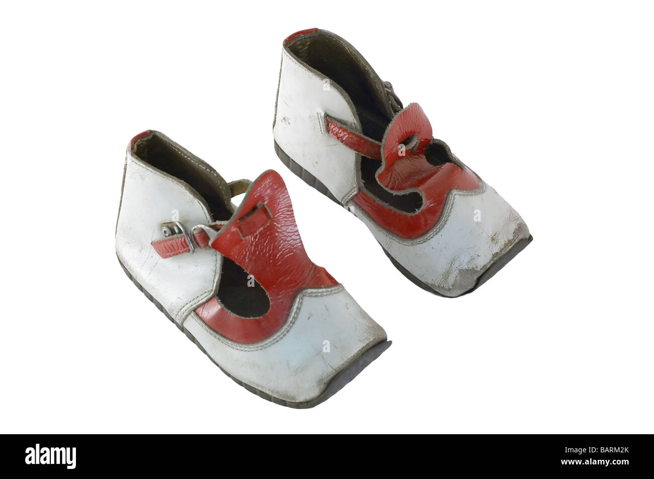 Children shoes from around 1950 isolated on white and clipping path included Stock Photo