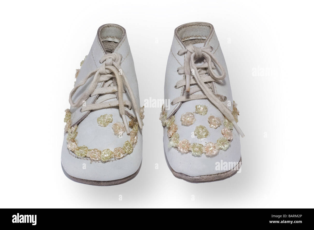 Children shoes from around 1940 isolated on white and clipping path included Stock Photo