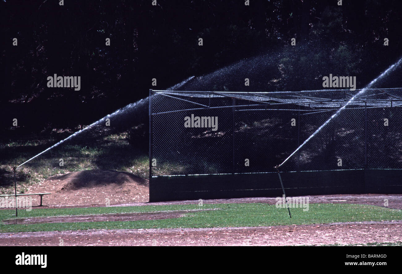 water sprinklers baseball field California Stock Photo Alamy