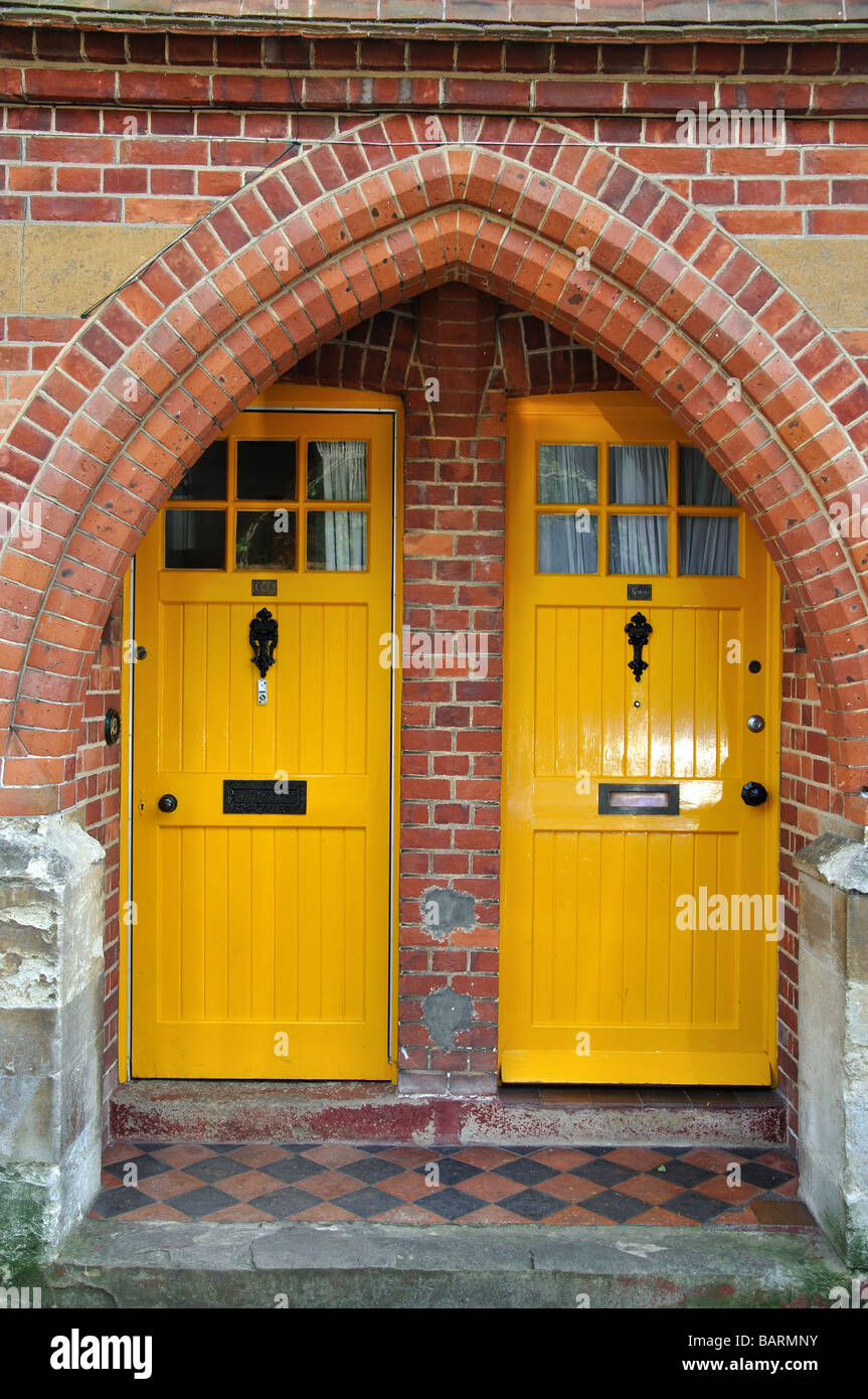 Yellow doors on period building, St.Anne's Hill, Midhurst, West Sussex, England, United Kingdom Stock Photo