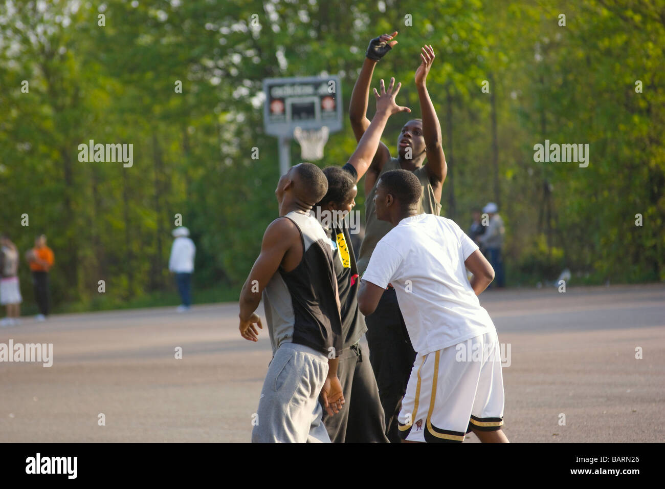 Casual basketball game on a Sunday afternoon in Finsbury Park London England UK Stock Photo