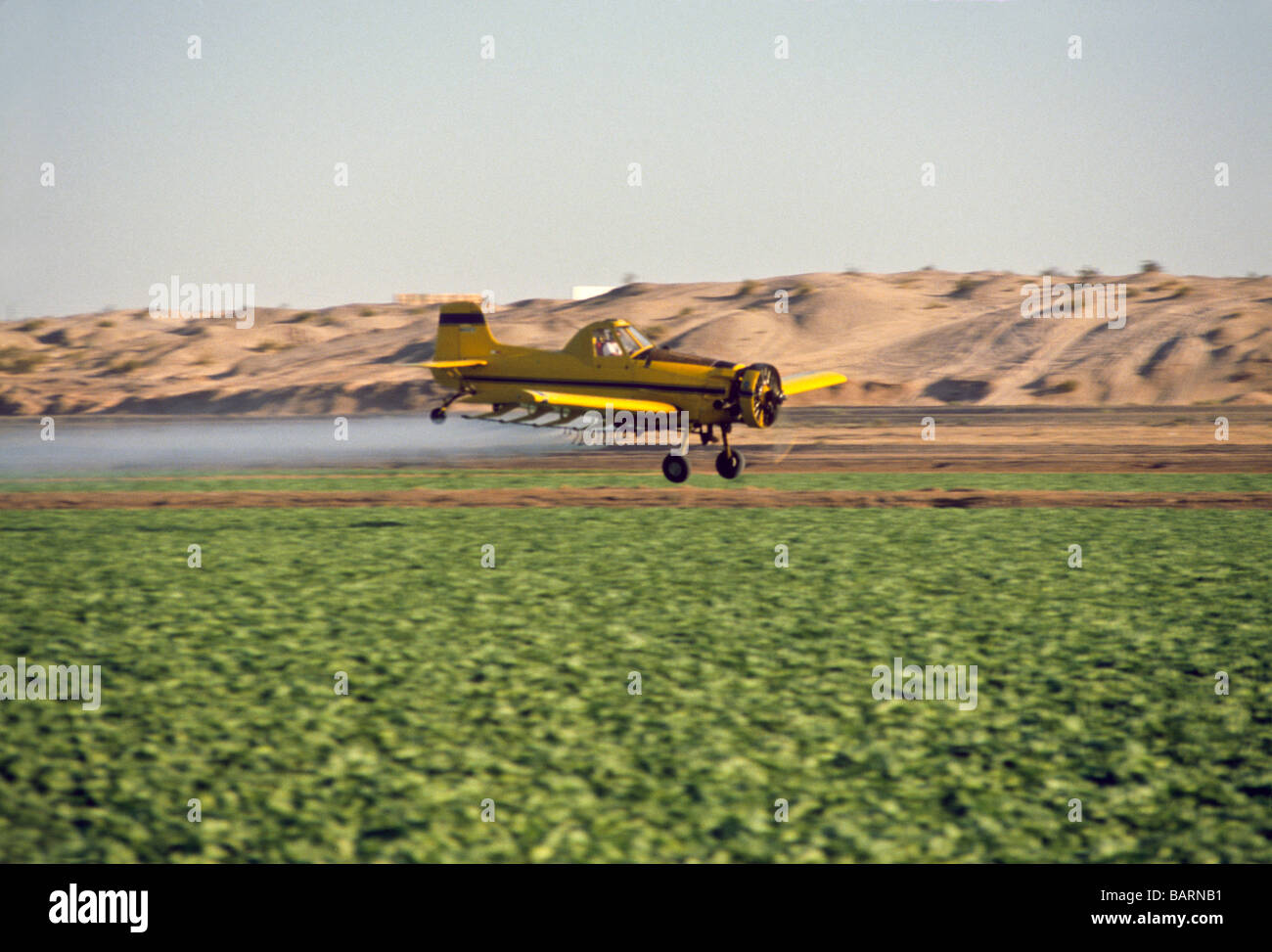 crop duster spray chemical pest control fertilizer air airplane plane