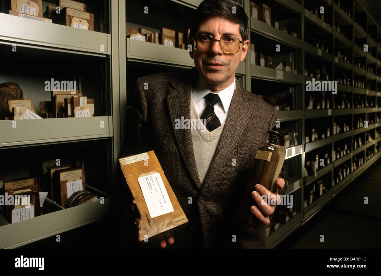 Kew Gardens London England 1990 David Field head of Kew's Economic and Conservation section with some of the 45,000 wood samples Stock Photo