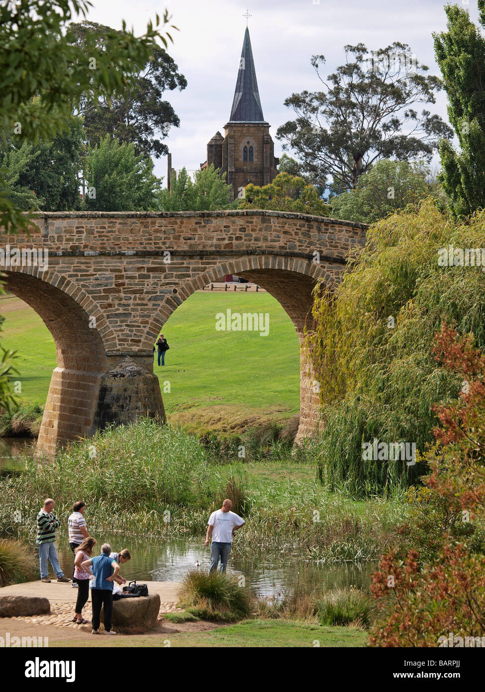 STONE BRIDGE CROSSING THE RIVER COAL AT RICHMOND NEAR HOBART TASMANIA AUSTRALIA Stock Photo