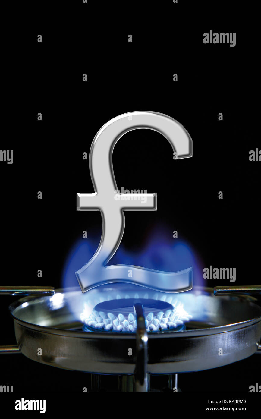 Flame of gas stove and British pound sign, close-up Stock Photo