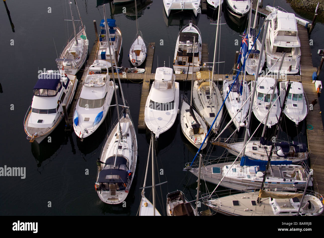 Boats docking at marina Stock Photo Alamy