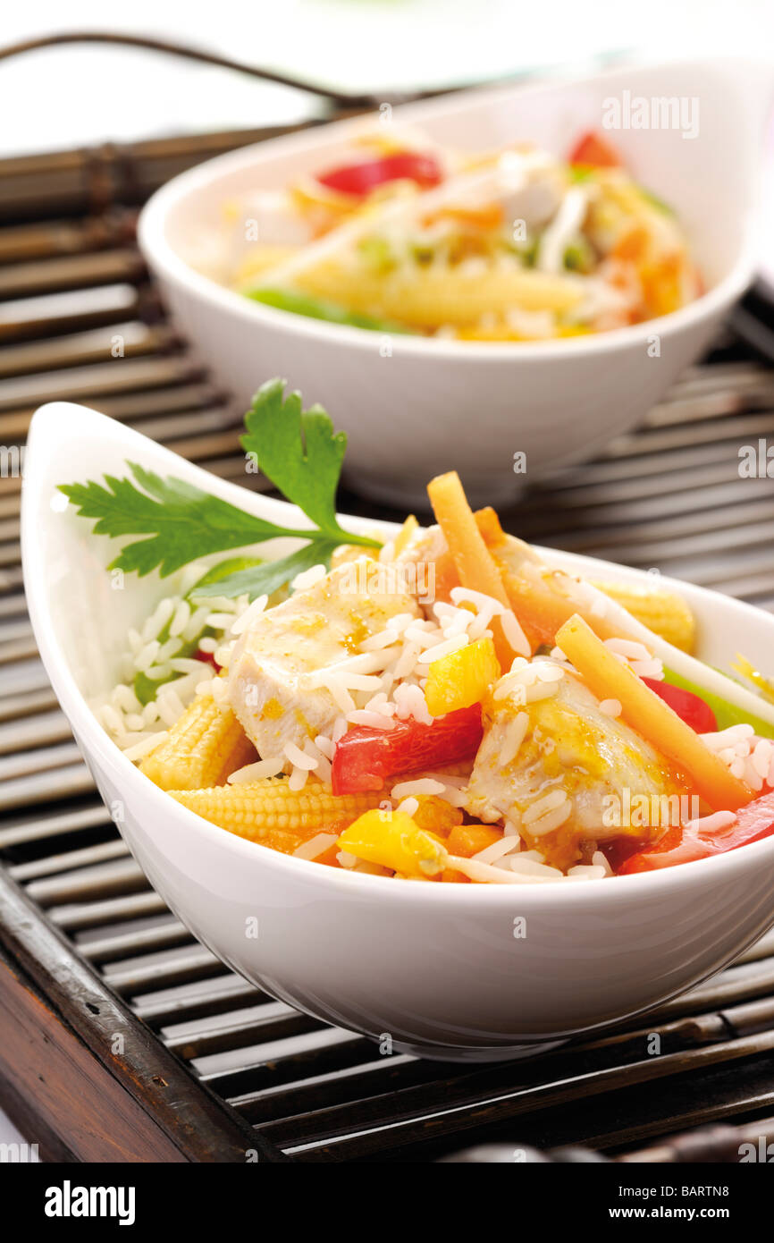 Asian dish with chicken, different vegetables and rice Stock Photo Alamy